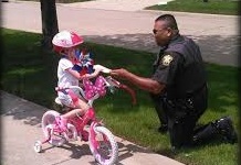 Officers Again Giving 'Tickets' to Kids Wearing Helmets